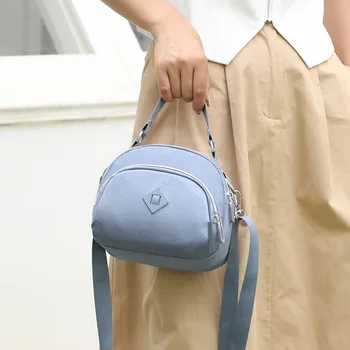 2023 Маленькая квадратная женская сумка в корейском стиле, многослойная для ношения через плечо или через плечо. 2